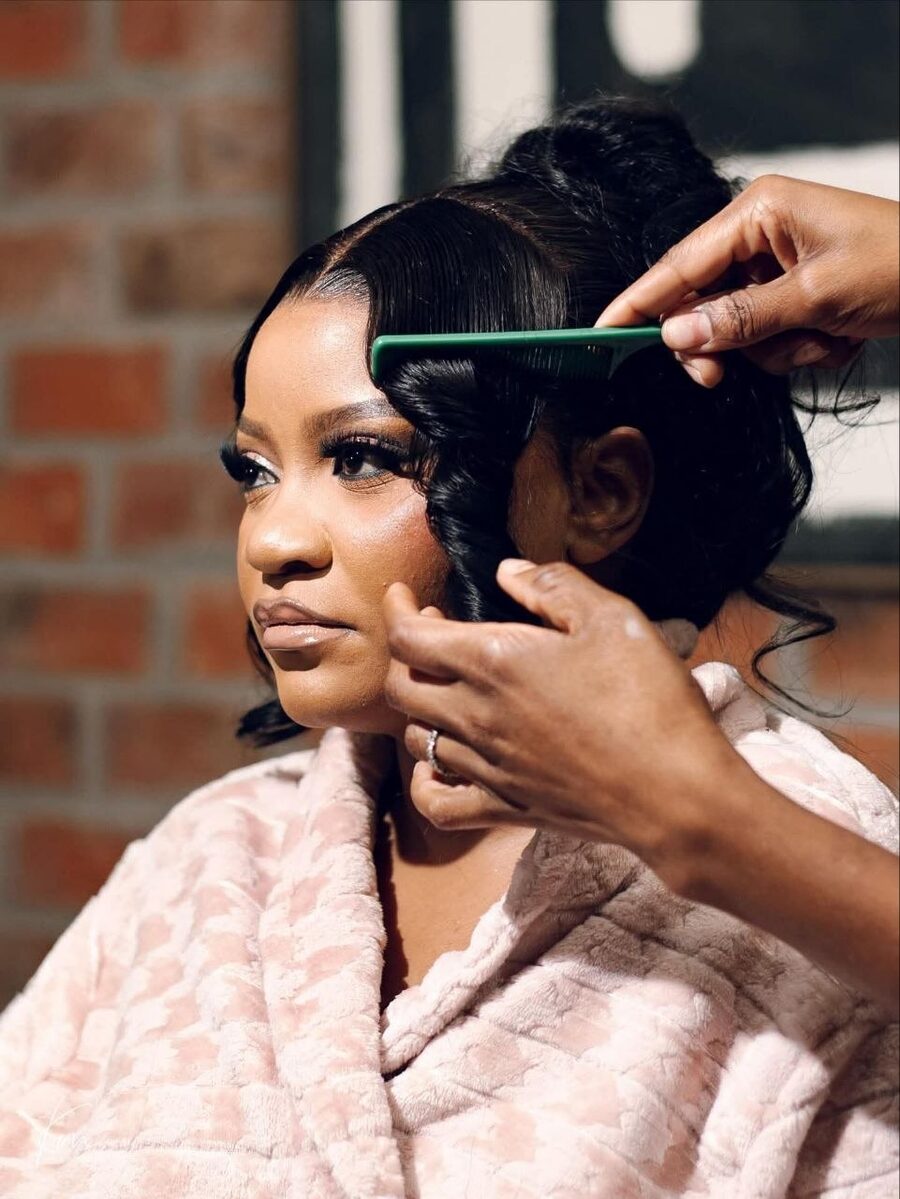 A Swt. Hair bridal unit being styled on the wedding day